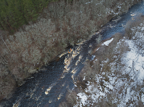 Rafting on the Jagala River in winter, drone air photography. High quality photo