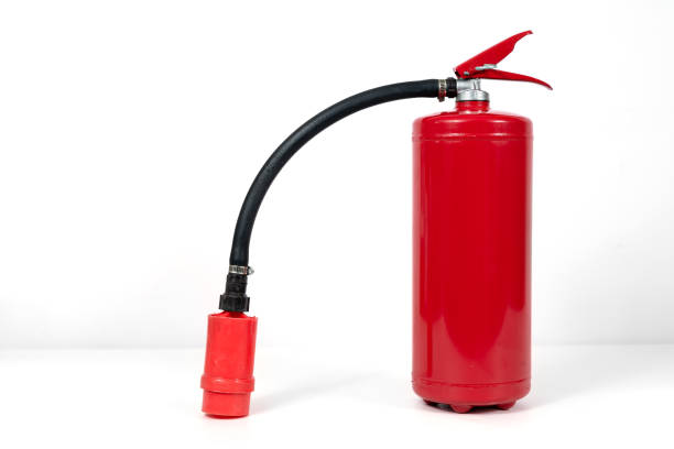 istock A red fire extinguisher with black hose on white background 2060757195