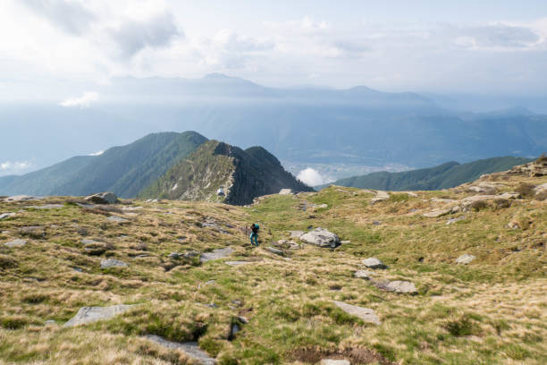 istock Summer Ascent: A Young Woman's Mountain Trail Adventure 2060757218