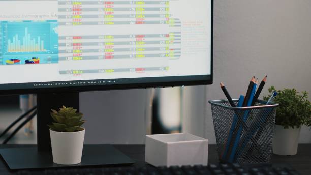 istock Stock trading economic analytics figures on PC screen, close up shot 2060757575