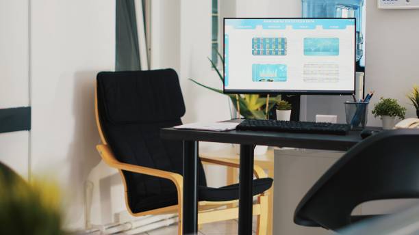 istock Computer screen in office showing stock exchange indices changing in real time 2060757776
