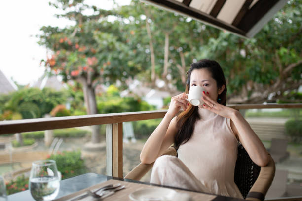 istock Woman drinking coffee at a resort 2060758460