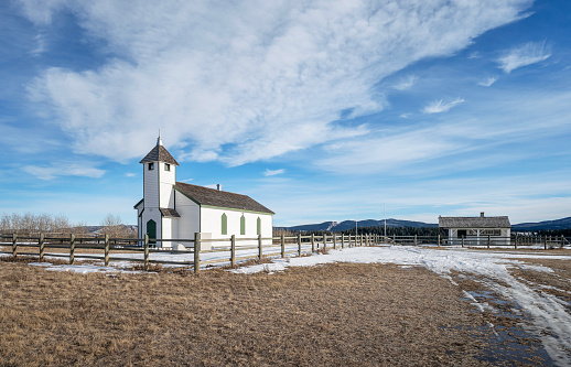Historic wooden McDougall Memorial United Church and outbuilding on the Stoney Indian Reserve at Morley, Alberta, Canada