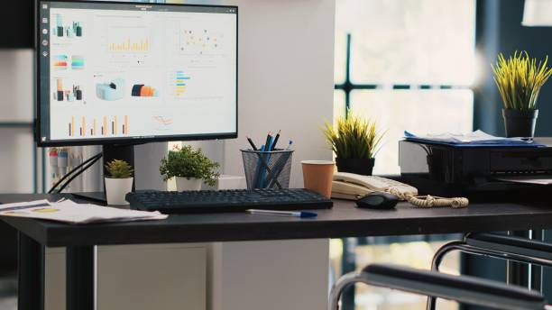 istock Wheelchair in inclusive office and display showing marketing planning data 2060769508