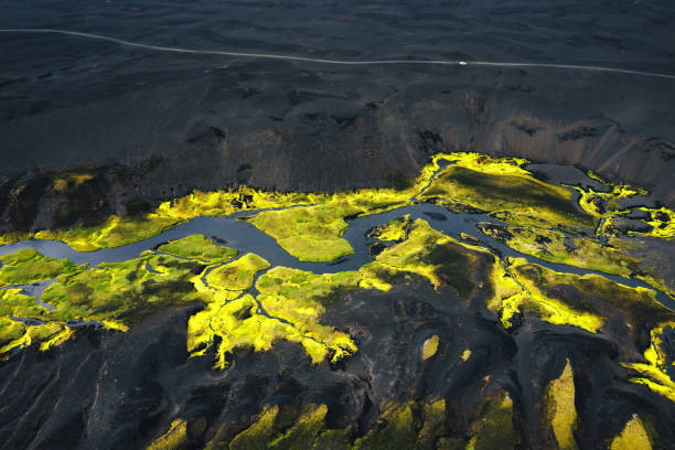 River flowing through the majestic black Icelandic landscape.