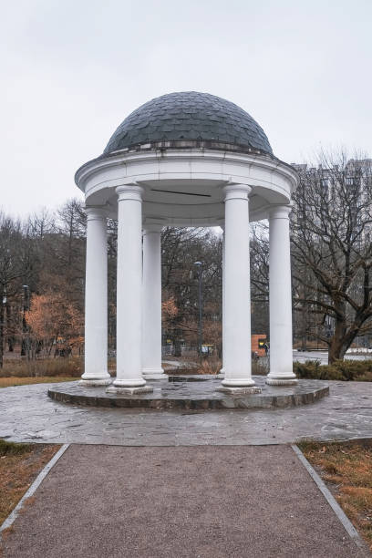 istock white rotunda with a dome in autumn in a Moscow park 2060799121