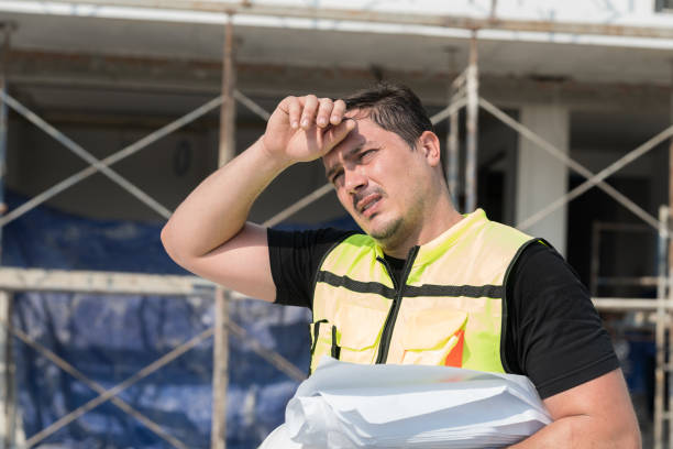 istock Foreman construction builder tired and thirst of water at construction site 2060800208