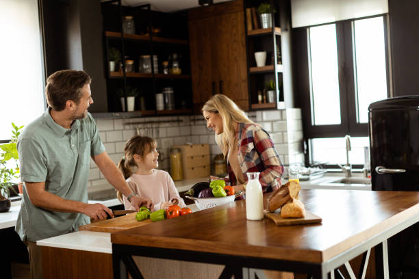 istock Family bonding time in a sunlit kitchen 2060832211
