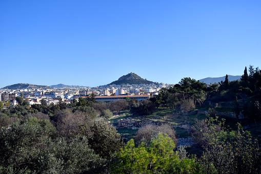 Athens, Greece - cityscape with view to Lycavittos Hill also known as Mount Lycabettus