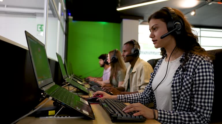 Group of students at the eSports lounge having fun playing games each on their laptop