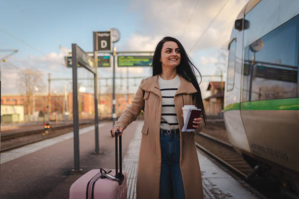 istock Beautiful young businesswoman getting ready to board a train 2060893709