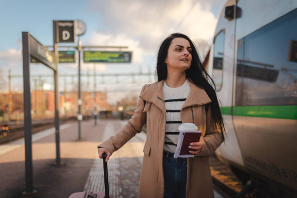 istock Beautiful young businesswoman getting ready to board a train 2060893710