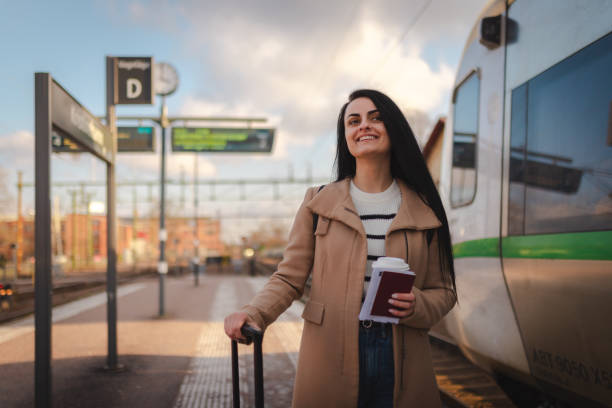 istock Beautiful young businesswoman getting ready to board a train 2060893714