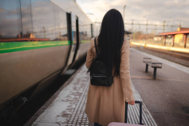 istock Unrecognizable woman boarding a train 2060893723
