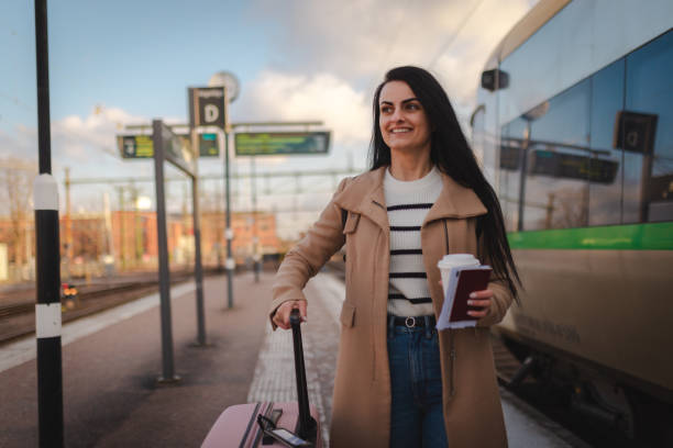 istock Beautiful young businesswoman getting ready to board a train 2060893727