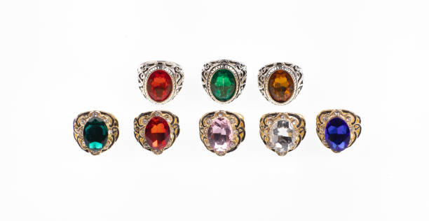 set of rings with precious colored stones isolated on white background
