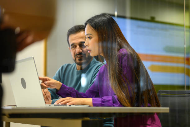 Business people working on laptop