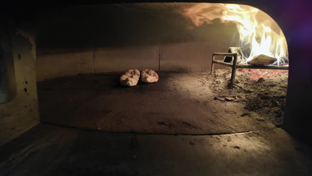 Turkish Pide Baking In A Stone Oven