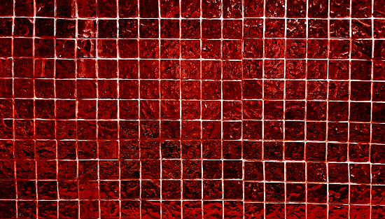 red square mosaic tiles texture use as background in close up view. grungy glass tiles for decoration for luxury, rich, elegant style concept.