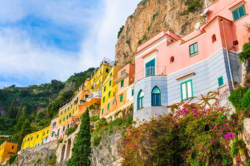 Amalfi coast, Italy. Colorful architecture on the rocks in Amalfi town. Beautiful cityscape at sunset