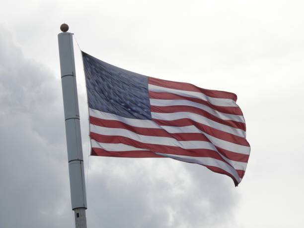 istock Oversize American Flag blowing in the wind 2061033340