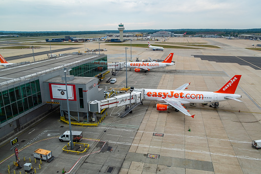 London, England  August 22 2013: Easy Jet and British Airways airplanes at London Gatwick Airport