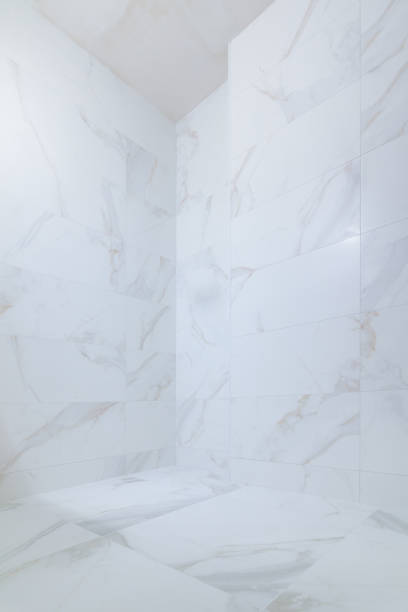 istock Bathroom corner white marble tiles background. Home reform concept 2061103213