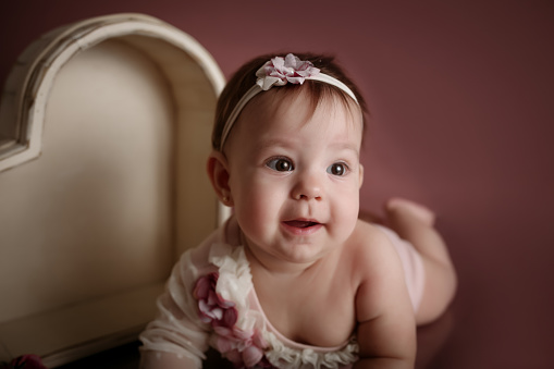 adorable baby posing with heart