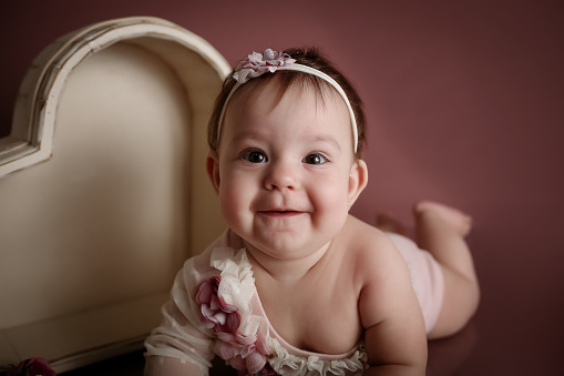 adorable baby posing with heart