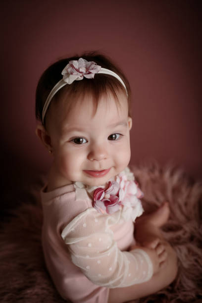 istock adorable baby posing with heart 2061104328