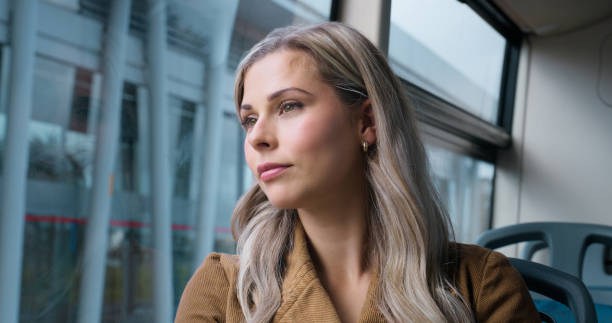 istock Woman, window or bus in vision for thinking, planning or dream idea for future, getaway or leisure. Female person, imagine or inspiration of hope, solution or decision on morning work commute 2061104456