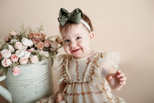 istock baby girl posing and smiling 2061137603