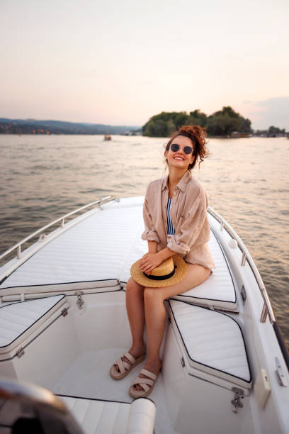 istock Woman sailing on a boat while on summer vacation 2061166114