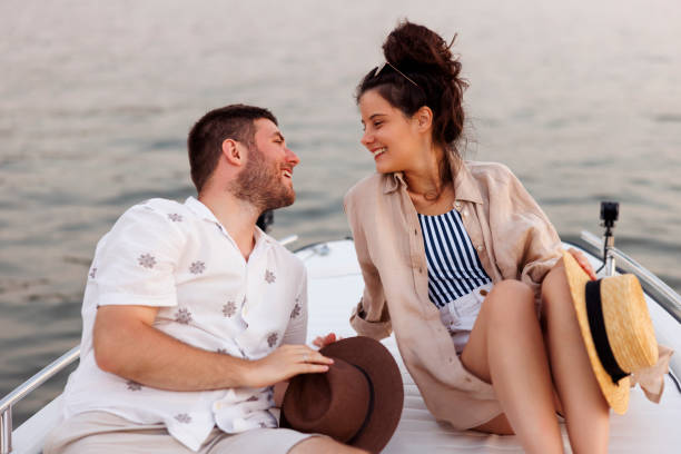 istock Couple relaxing while sailing on a boat on summer vacation 2061169746
