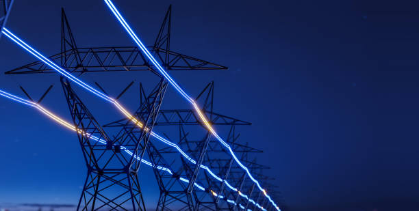 istock High voltage electric transmission tower with glowing current line, electrical power transmit through wire to city and house at night, Renewable green energy grid infrastructure concept 3d rendering 2061179119