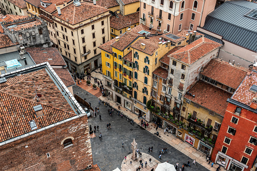 Famous panoramic view above the roofs of Verona, seen from Torre dei Lomberti, Italy