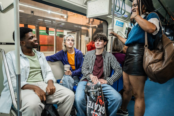 istock Friends talking in railroad car 2061250580