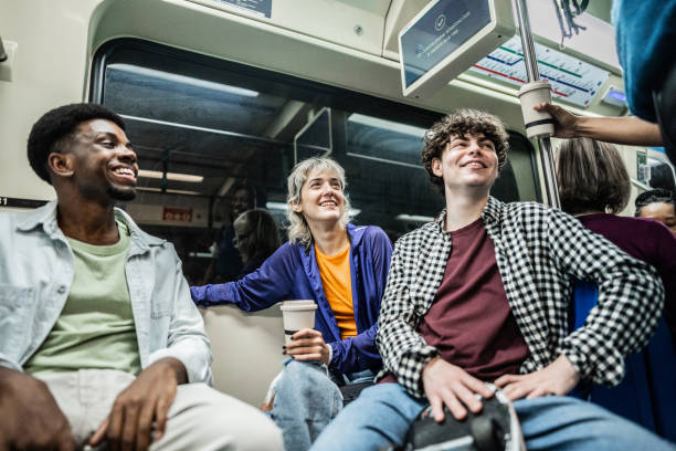 istock Friends talking in railroad car 2061250582
