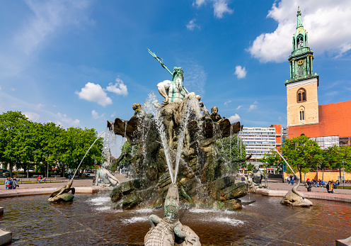 Berlin, Germany - May 2019: Neptune fountain (Neptunbrunnen) on Alexanderplatz square