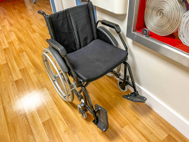 istock Wheelchair parked in long corridor 2061293018