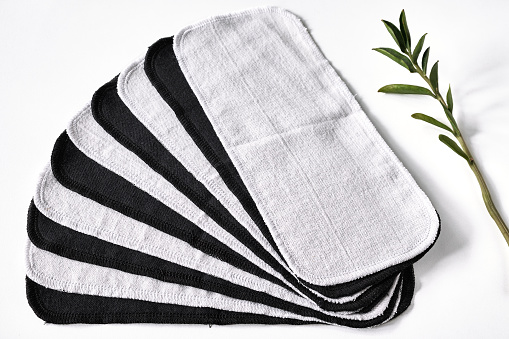 Black and white reusable toilet paper. Washable paper towels. Zero waste cloth wipes. Sustainable plastic free tissues. World environment day.