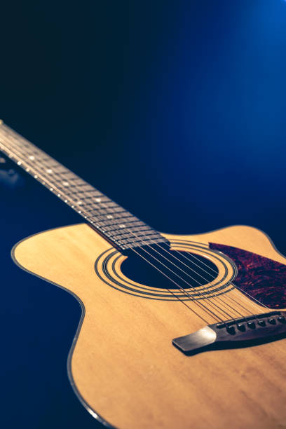istock Musical background with acoustic guitar close up. 2061303035