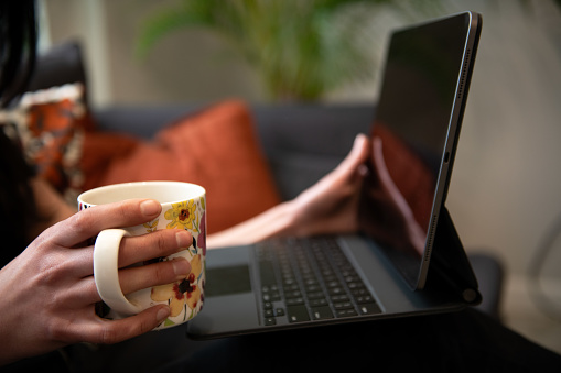 Woman using her laptop for working from home