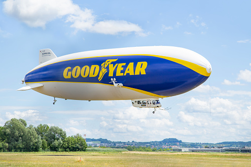 Goodyear Zeppelin, Airship lands in Friedrichshafen.
The Zeppelin takes off from Friegrichshafen for sightseeing flights over Lake Constance and the Alps.