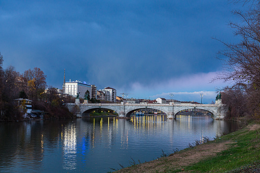Po River and Ponte Umberto at dusk in Turin, Italy
