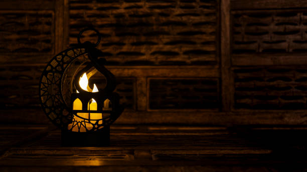 Muslim Holy Month Ramadan - with Ornamental Arabic Lantern and dates.