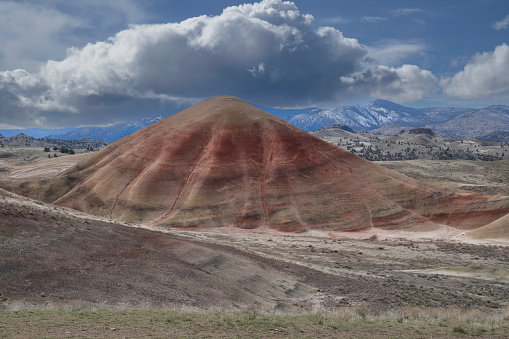 The Painted Hills are one of the three units that comprise the John Day Fossil Beds. Take time to also visit the Clarno Unit, with Mars-like pillars formed by waterfalls and volcanic sludge, and the Sheep Rock Unit, where fossils of plants and animals like saber-toothed cats are on display at the Thomas Condon Paleontology Center. The hills get their name from the delicately colored stratifications in the soil and the yellows, golds, blacks and reds of the Painted Hills are best seen in the late afternoon. Tones and hue may appear to change from one visit to another, as the claystone differ with ever-changing light and moisture levels. Once you see them for yourself, it’s pretty easy to understand why the Painted Hills are one of the 7 Wonders of Oregon.