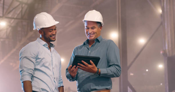 istock Inspection, teamwork and men in warehouse with tablet for discussion, development and supply chain storage. Planning, contractor and project manager in factory with online digital app for maintenance 2061480445