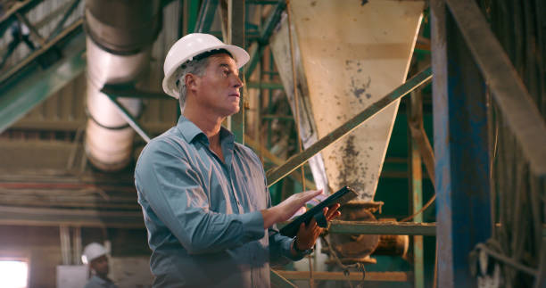 istock Tablet, inspection and man with engineering, helmet and industrial with online information and digital app. Mature person, architect and employee with tech and thinking with maintenance and hard hat 2061483696