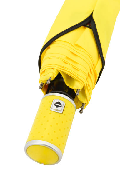 istock Open yellow umbrella isolated on white background 2061494832